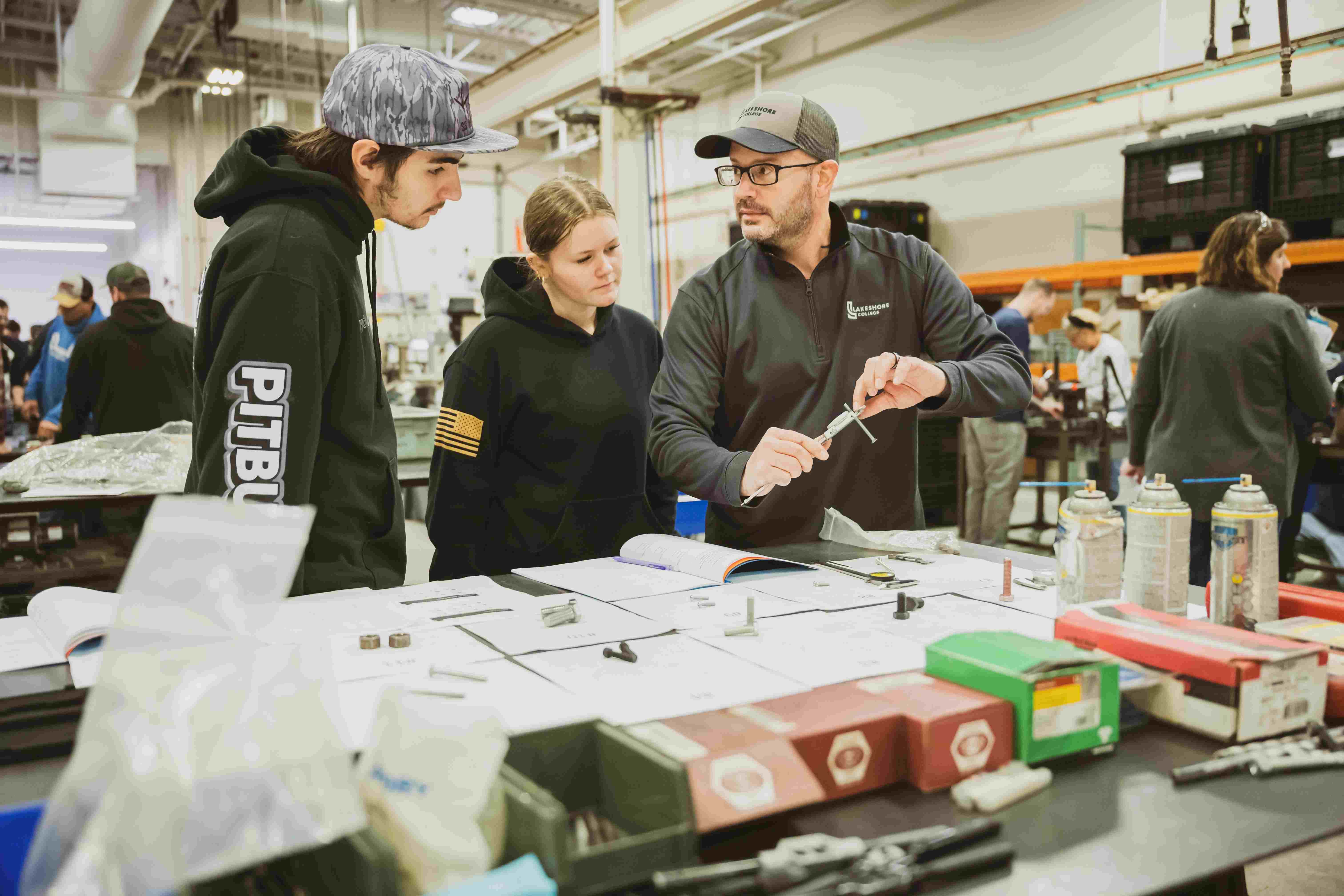 Instructor walking students through a lab.