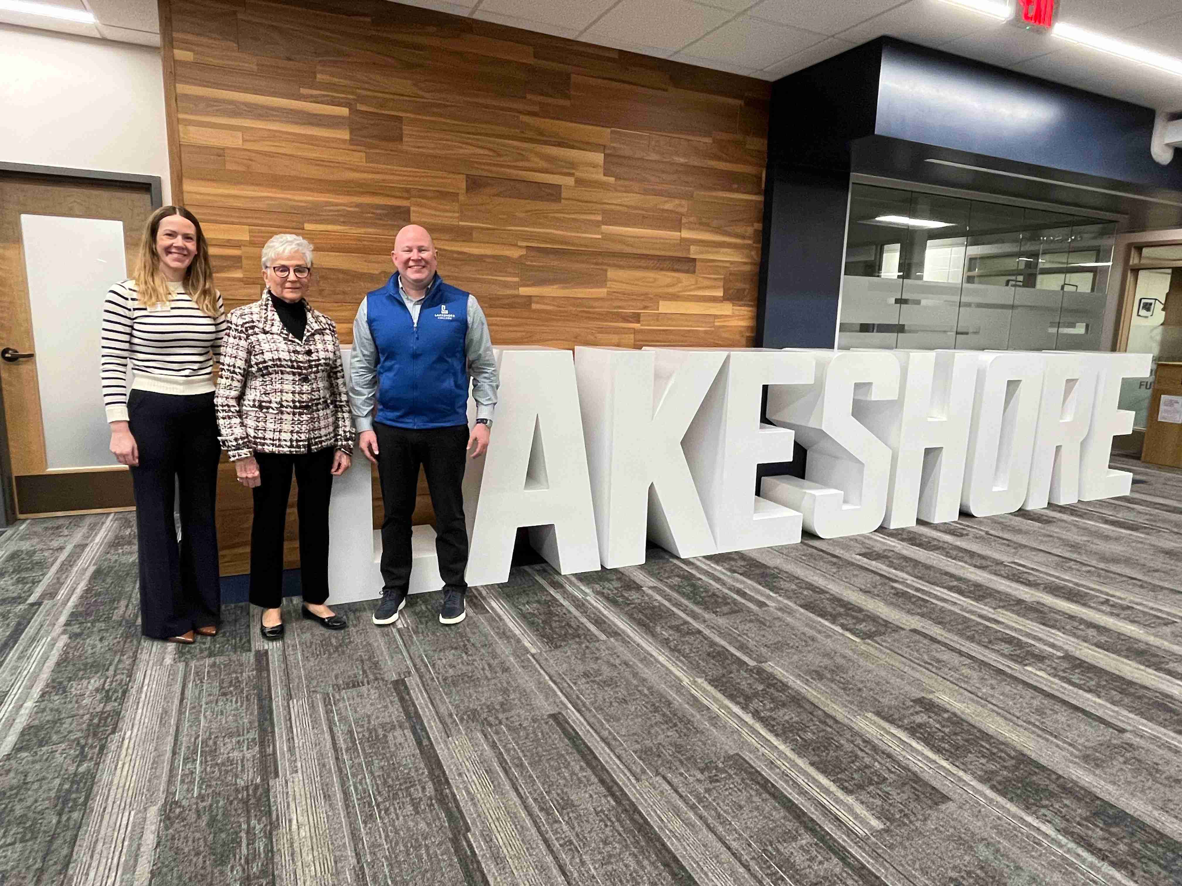 Executive Director of the Lakeshore Foundation Courtney Donati (left) stands with donor Elsie Patterson (center) and Lakeshore College President Paul Carlsen at Lakeshore College. Patterson established the Eugene A. and Elsie E. Patterson Scholarship Fund with an initial gift of $62,760.54.