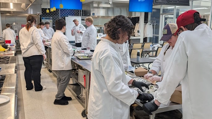 Jr Chef working together in the culinary lab