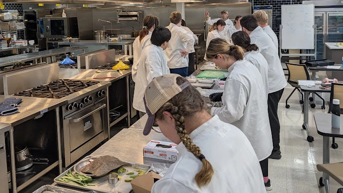 Jr Chef working together in the culinary lab