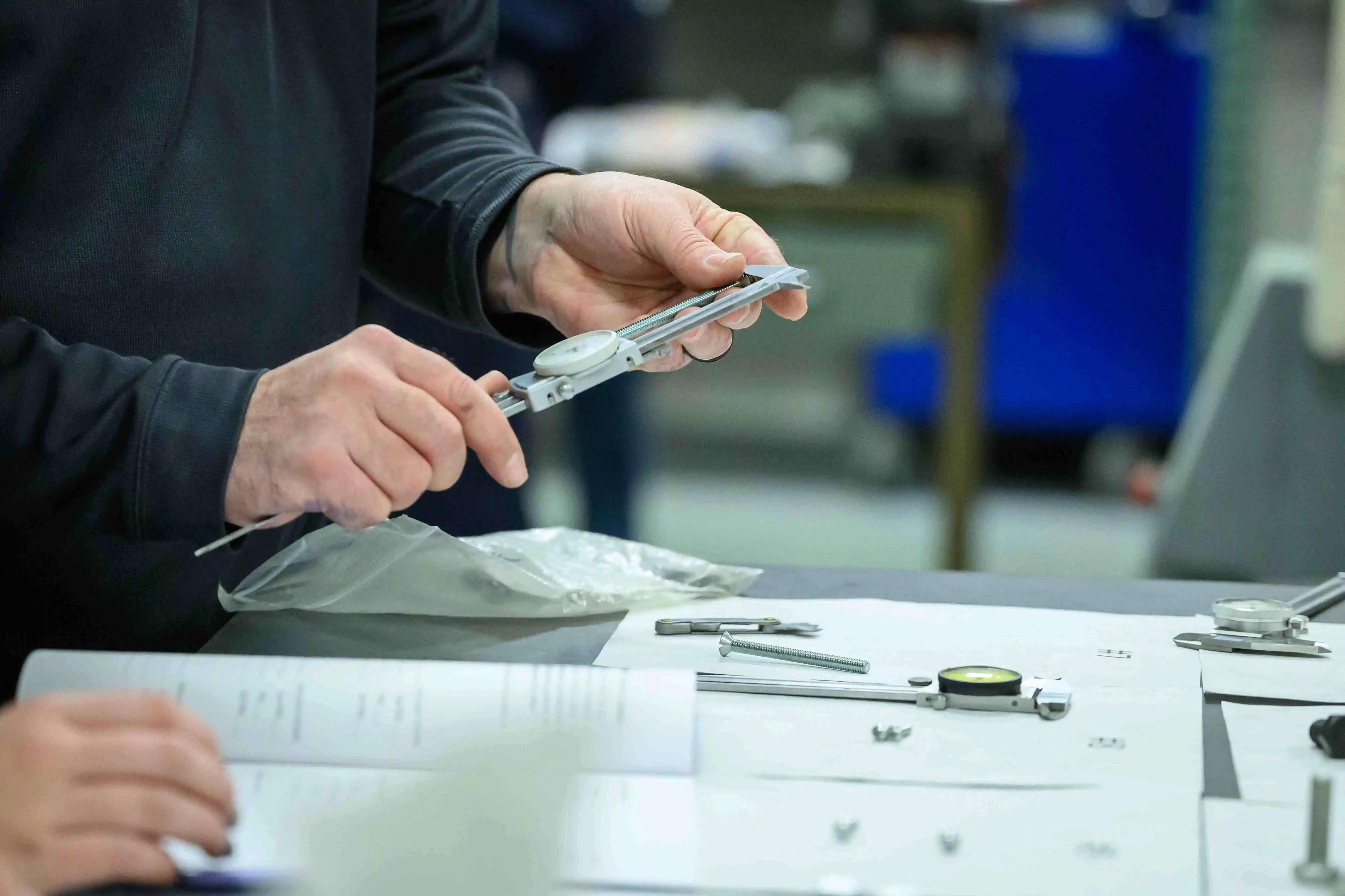 HVAC Student using a tool