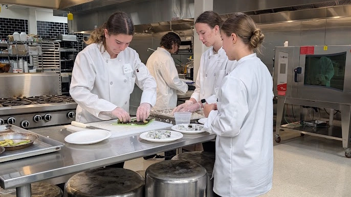 Jr Chef students cooking in the culinary lab