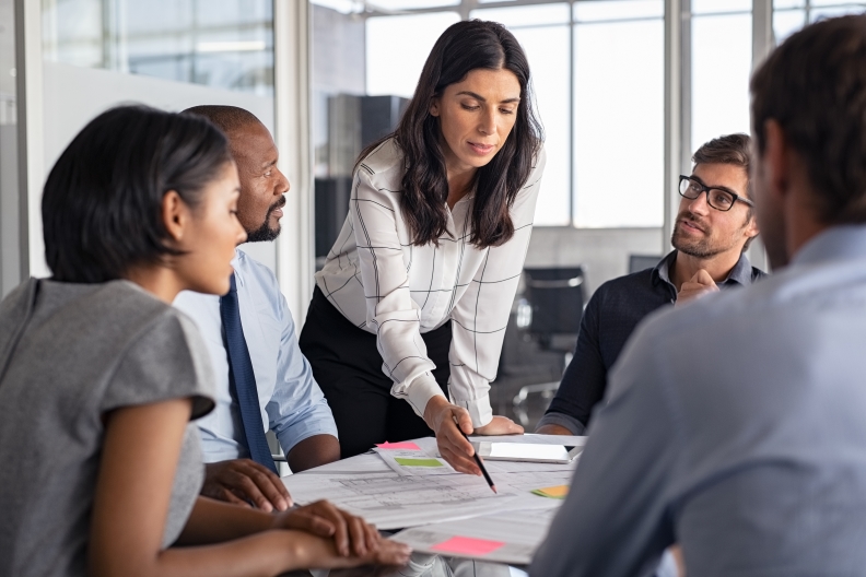 A group of people having a meeting