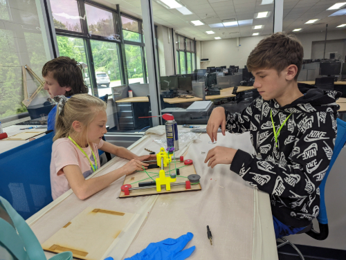 A group of kids working on a project