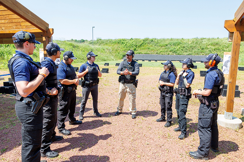 Lakeshore College Criminal Justice Instructor Luke Deibele meeting with students in the summer 2025 Advanced Tactics course. Photo courtesy of Lakeshore College