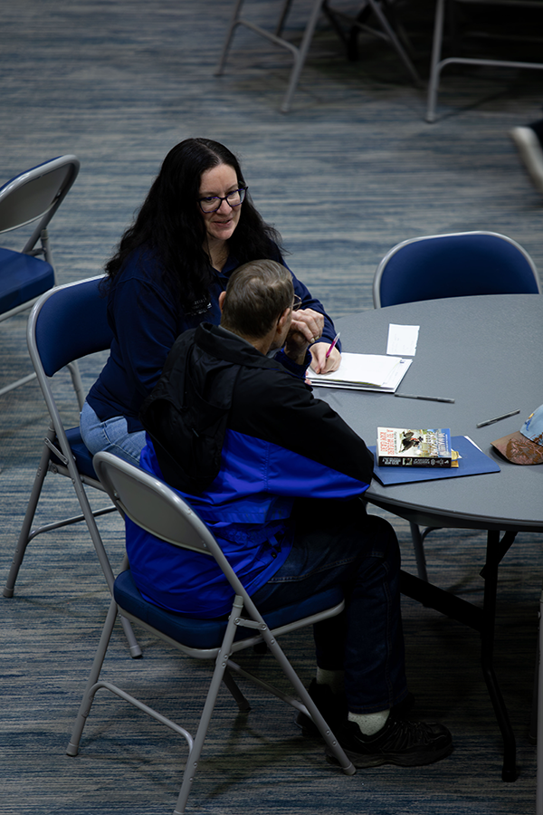Lakeshore College VITA student assisting a community member