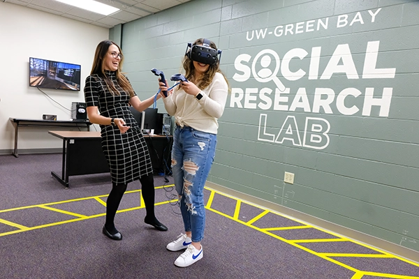 Psychology student in social research lab