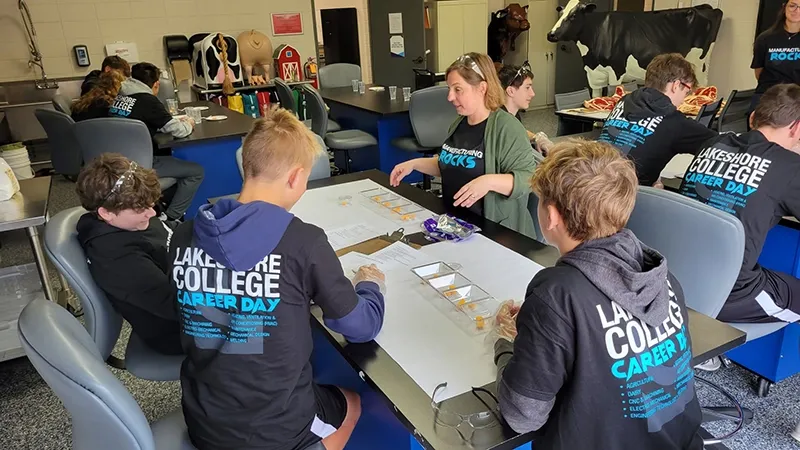 Students participating in the manufacturing rocks event.